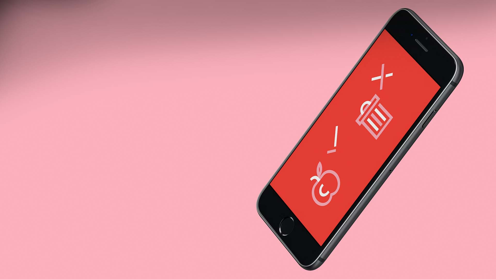 Smartphone med rød skærm og ikoner for madspildsapp, der viser et udråbstegn, et plus tegn, en indkøbskurv og et omvendt æble, på en ensfarvet lyserød baggrund.